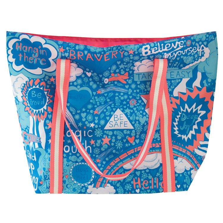 A large tote bag with neon pink handles featuring abstract art with words of advice and colorful illustrations including rainbows and stars on a blue background.