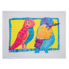 Framed drawing of two pink, yellow and blue birds
