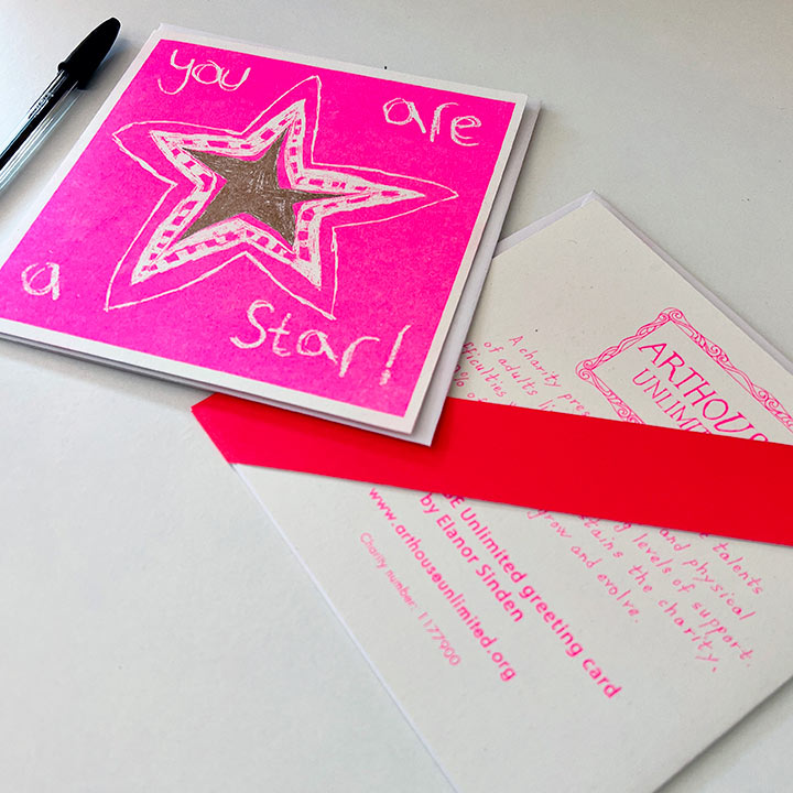 A pink and gold card with a hand drawn star and the words you are a star!