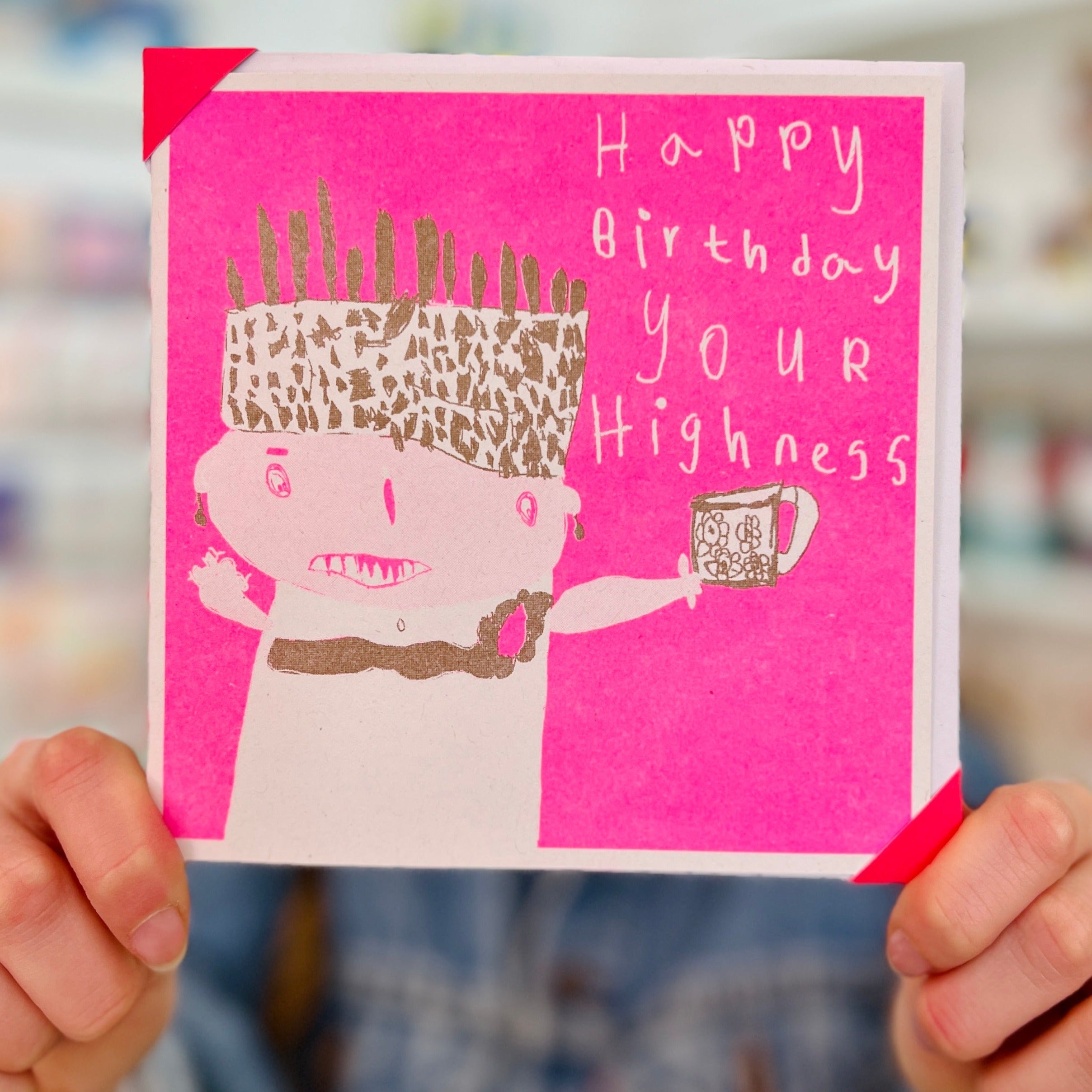 Bright pink and gold card with a hand drawn woman and the words happy birthday your highness