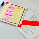 A pink, yellow and gold card with a hand drawn birthday cake and the words my ideal birthday cake 