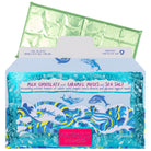 open packet of Swim with Whales, Milk Chocolate Bar with Caramel & Sea Salt with green foil