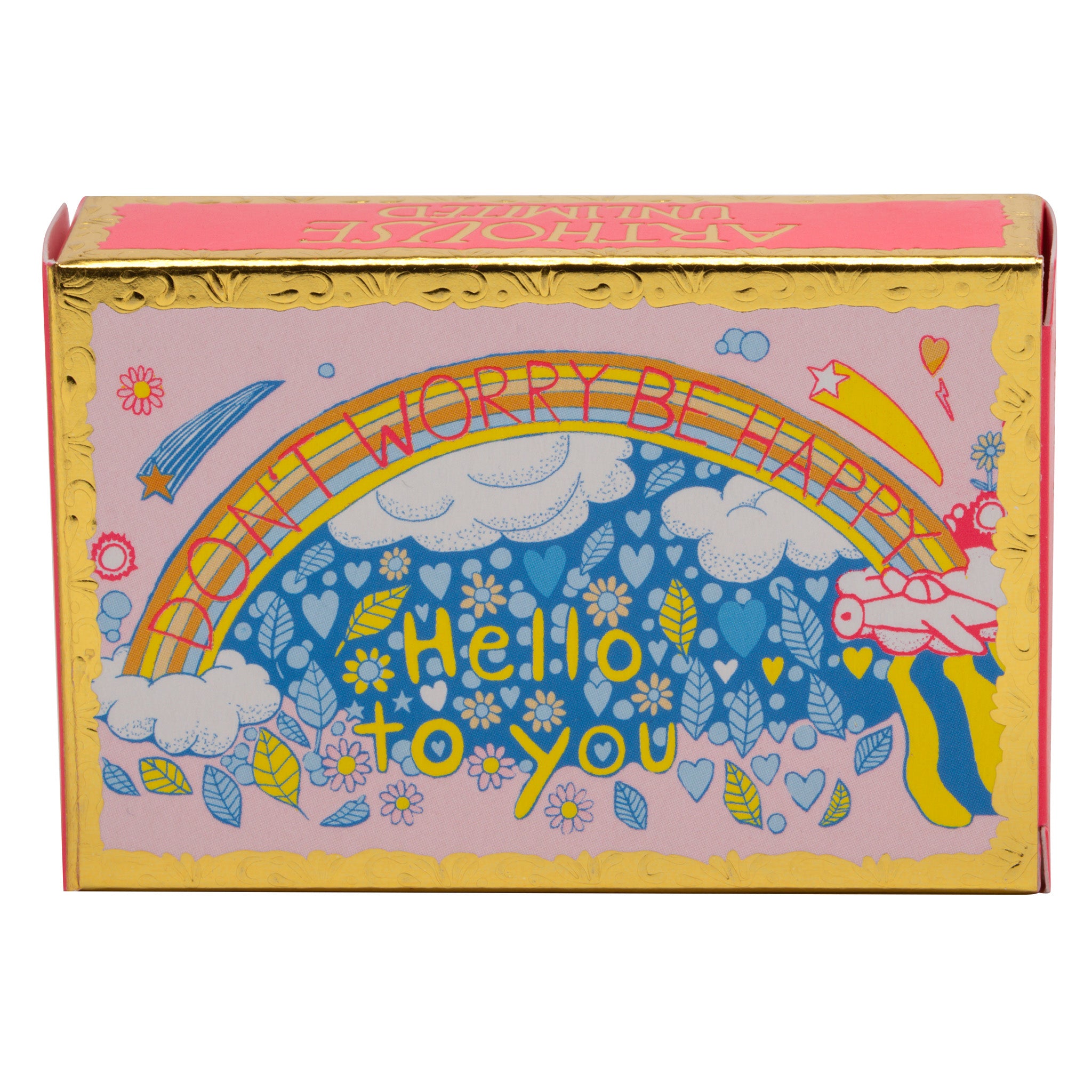 A packaged bar of soap with colorful artwork featuring rainbows and text 'Be Happy' on the wrapper.