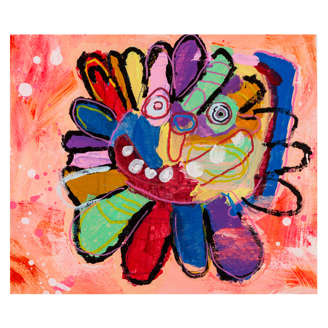 Unframed painting of a flower mask in bright colours and a happy face