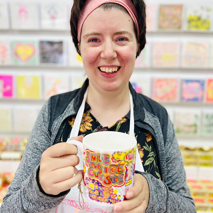 Female artist holding Full of Joy, Fine Bone China Mug