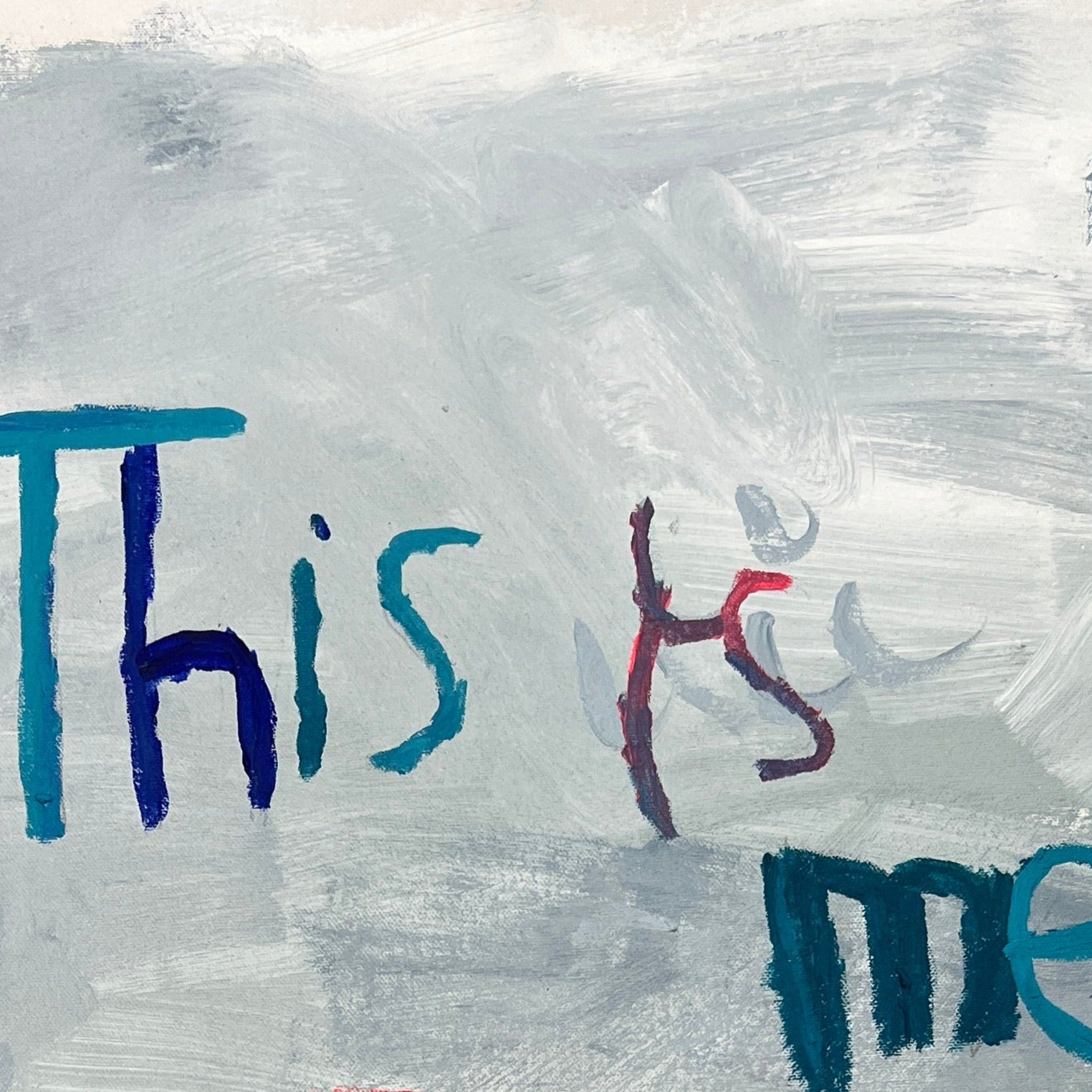 Close up of painting of the words 'this is me' in blues and greys 