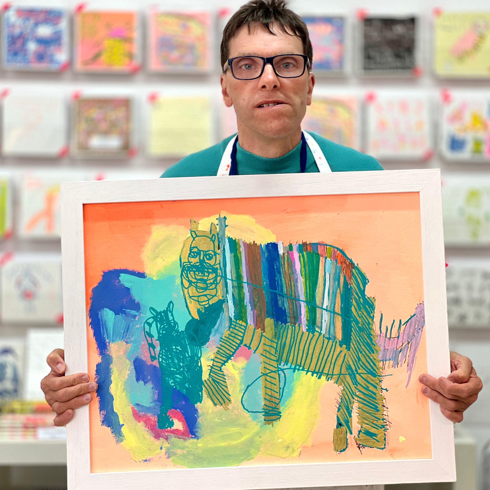 Male artist Framed painting of a striped creature in blues and oranges called Wild Sunrise