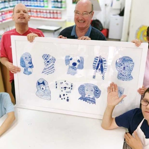 5 artist holding original artwork of Blue Dogs, Riso Print