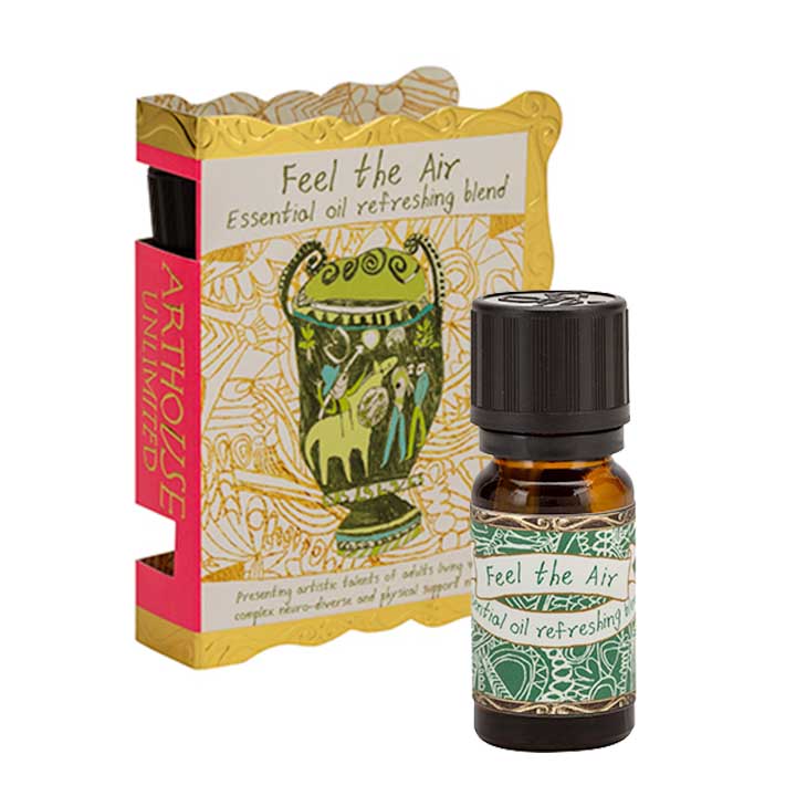 Gold and green packet and bottkle of Feel The Air, Well Being Essential Oil, Refreshing Blend